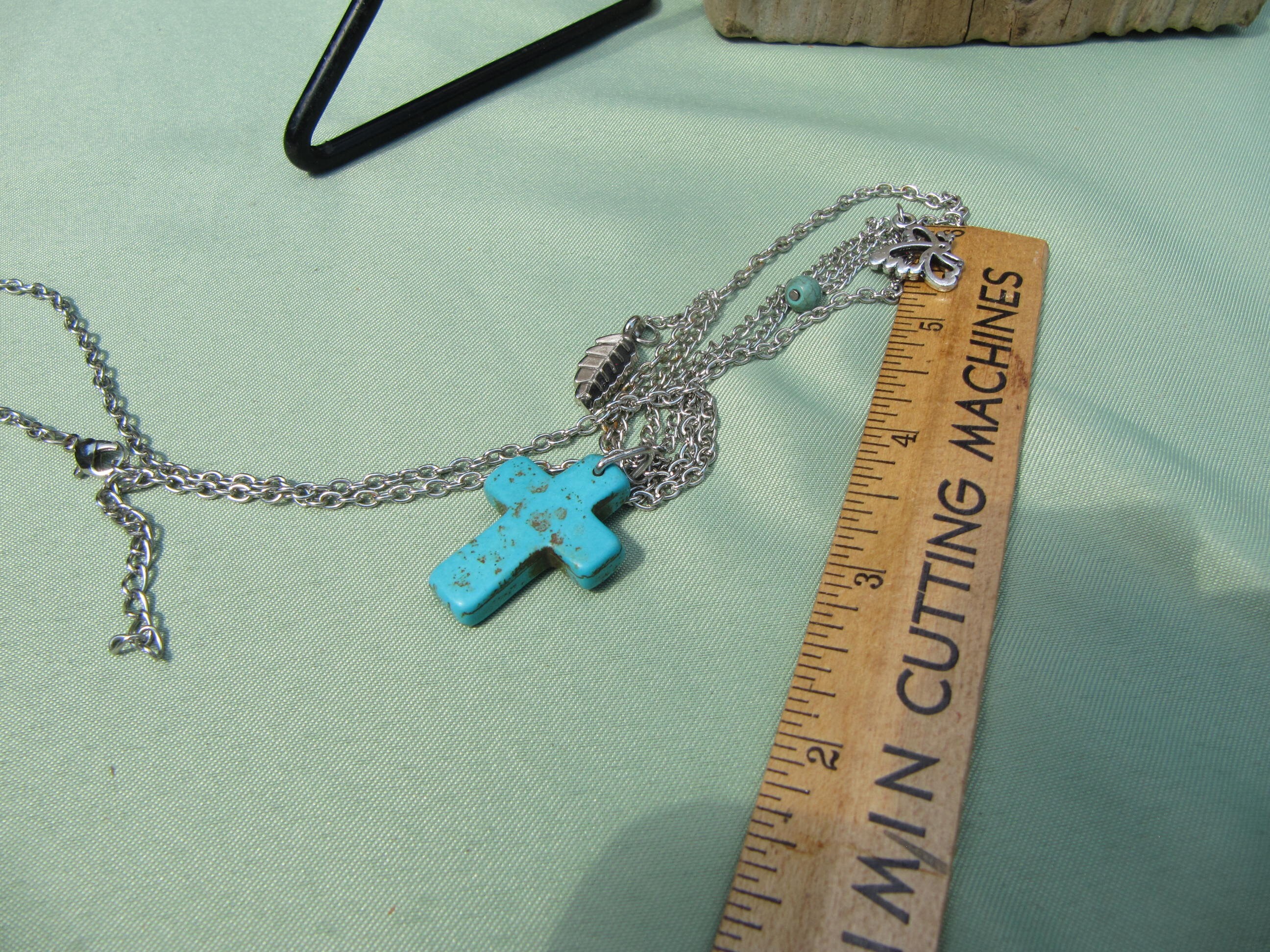 TURQUOISE CROSS and CHARMS on Silver Tone Chain, One in TURQUOISE CROSS and CHARMS on Silver Tone Chain, One in