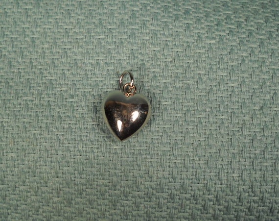 HEART OF CHROME, one half inch in diameter, tiny silver tone heart, small heart trinket, little tiny heart, heart charm, miniature heart