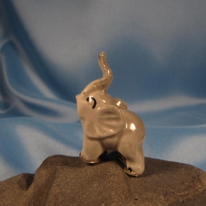 MINIATURE ELEPHANT made of fine China, Gray Elephant, Mini Elephant with Shiny gray Coat, Raised trunk Elephant,Ceramic tiny elephant
