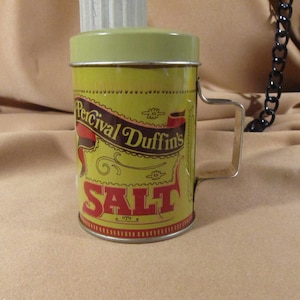 PERCIVAL DUFFINS SALT Shaker made in Hong Kong, metal faux antique Metal Canister salt shaker made to look old in 1970 new old stock unused