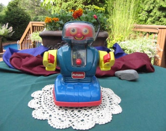 PLAYSCKOOL VINTAGE ROBOT, 1960 Playschool toy robot,remote control 9 inch plastic toy robot for display purposes, toy robot blue red robot