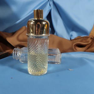 Nina Ricci PERFUME BOTTLE, Nina Ricci perfume Miniature bottle made in France, l AIr Du Temps Bottle from Paris France half full perfume