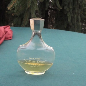 MINIATURE PERFUME BOTTLE, Nina Ricci perfume Miniature bottle made in France, l AIr Du Temps  quarter full Bottle from Paris France,1 ounce