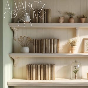 May include: A three-tiered, off-white wooden shelf unit displays vintage books, small vases with dried flowers, and framed botanical prints. A glass cloche with a plant and decorative items add to the aesthetic. The text "ALVAREZ CREATIVE CO" is at the top left.