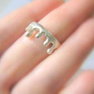 Molten solid silver ring. Statement 925 silver ring. Dancing drops silver ring. Molten metal jewelry.