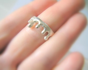 Molten solid silver ring. Statement 925 silver ring. Dancing drops silver ring. Molten metal jewelry.