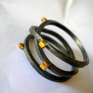 oxidized sterling silver infinity ring with gold plated square dots. Triplet ring