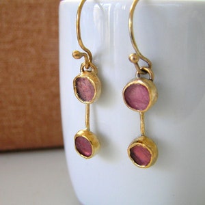 Tourmaline gold plated sterling silver dangle earrings. image 1