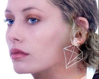 Sterling silver diamond shape geometric earrings.