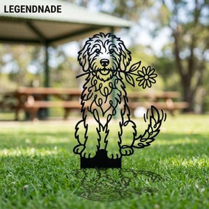 May include: Black metal yard art of a dog holding a flower in its mouth. The dog is sitting with its tail curled up. The word "LEGENDNADE" is at the top. The art is placed in a grassy area.