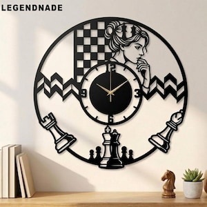 May include: Black wall clock with chess-themed design. Features a woman's silhouette, chess pieces, and a checkered pattern. The clock hands are gold. The brand name "LEGENDNADE" is at the top.
