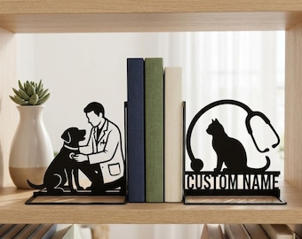 May include: A pair of black metal bookends featuring a veterinarian examining a dog on the left and a cat silhouette with a stethoscope on the right, with the text CUSTOM NAME printed below the cat figure.