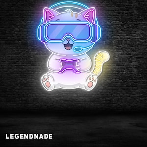 May include: A neon sign depicting a cartoon cat gaming, wearing a headset and goggles, and holding a controller. The cat is white, pink, and purple, with a yellow tail. The sign is outlined in blue and pink neon against a dark brick wall. The text "LEGENDNADE" is at the bottom.