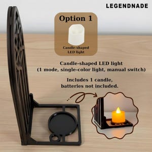 May include: A black, decorative LED candle holder with a candle-shaped LED light. The image includes text that reads "Option 1" and "Candle-shaped LED light". The text also states that it includes 1 candle, but batteries are not included.