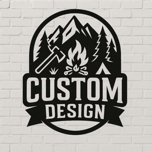 May include: Black and white circular design featuring a mountain range, pine trees, a campfire, and an axe. The words "CUSTOM DESIGN" are displayed in bold, white letters, with a banner at the bottom. The design is suitable for outdoor enthusiasts.
