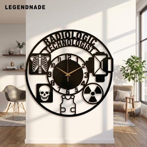 May include: A circular black wall clock featuring the text RADIOLOGIC TECHNOLOGIST at the top. The design includes cutouts of a rib cage X-ray, a human skull, a radiation symbol, a protective vest, and medical imaging equipment icons.