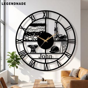 May include: A large circular black wall clock featuring Roman numerals and a central design depicting construction elements including a soil cross-section, a drilling rig, a surveying instrument, and a hard hat, with the name John printed below.