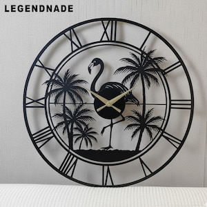 May include: Black metal wall clock featuring a flamingo and palm trees silhouette. The clock has Roman numerals and gold-colored hands. The brand name "LEGENDNADE" is at the top. A decorative piece for a tropical-themed room.