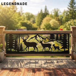 May include: A black metal railing panel featuring a laser-cut silhouette of a forest scene with a buck, a doe, and a fawn standing before mountain peaks. The text LEGENDNADE is visible in the upper left corner of the rectangular metal insert.