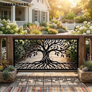 May include: A black metal decorative panel featuring a detailed tree of life design with intricate branches, leaves, and roots. The panel is framed by wooden posts and is positioned on a wooden deck, with the text LEGENDNADE visible in the top corner.