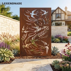 May include: A rectangular, rust-colored metal garden screen featuring laser-cut designs of multiple birds in flight and leafy branches. The panel is positioned vertically outdoors, displaying the text LEGENDNADE in the upper left corner.