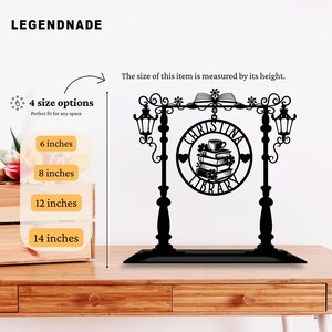 May include: Black metal sign with the text "CHRISTINA LIBRARY" inside a circle, featuring a stack of books and a coffee cup. The sign has two lamp post-style supports and is available in 6, 8, 12, and 14-inch heights.