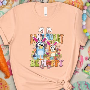 Don't Worry Be Hoppy Easter Shirt, Bluey Easter Shirt, Cartoon Dog Easter Tee, Easter Kids Gift, Bunny and Eggs Bluey Tee, Easter Kids Shirt