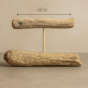 Close-up of  driftwood jewelry holder, showing that the length of the rod that holds the jewelry is approx 12 in long.