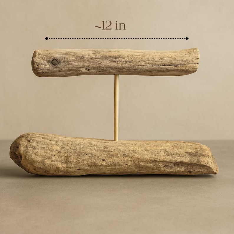 Close-up of  driftwood jewelry holder, showing that the length of the rod that holds the jewelry is approx 12 in long.