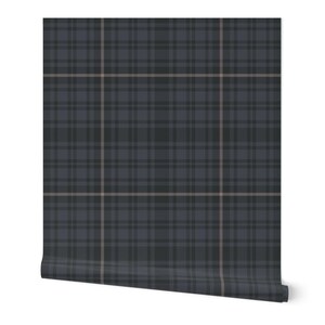 May include: A roll of wallpaper featuring a dark blue and gray plaid pattern with thin tan accent lines. The plaid design is a classic pattern, suitable for various interior design styles. The roll is partially unrolled, revealing the pattern.