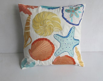 Sea themed cushion cover. Notical pillow in off white with sea life embroidery in cobalt yellow and orange. Beach decor. Custom made.