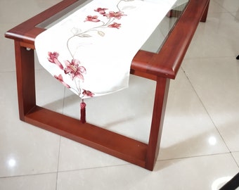 Lovely spring table runner. With floral embroidery.  Burgundy and white table line. 6 seater and 8 seater table runner. In stock table line.