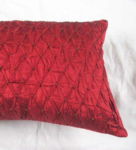 red oblong throw pillows