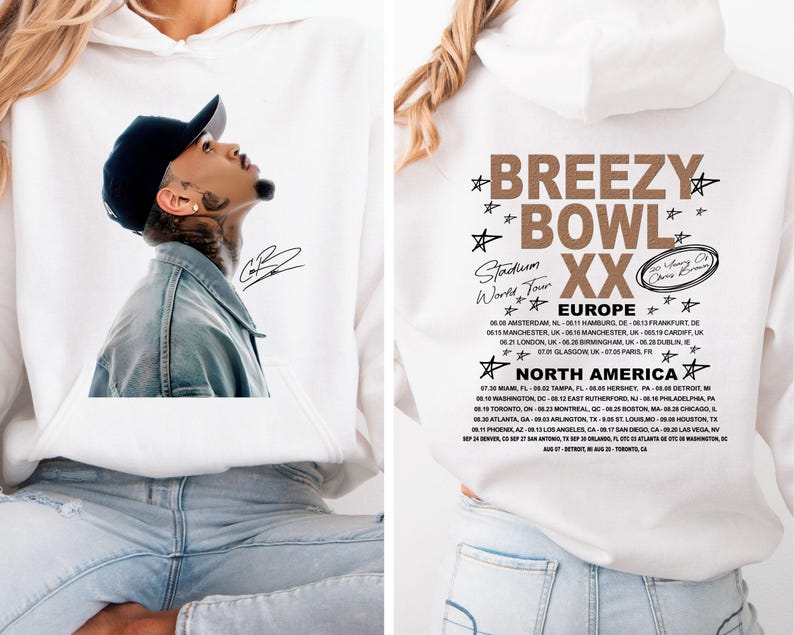 May include: White hoodie featuring a portrait of a man wearing a black cap and denim jacket, with his signature. The back of the hoodie displays "Breezy Bowl XX" tour dates for Europe and North America.