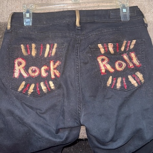 Calvin Klein black jeans-  rock n roll