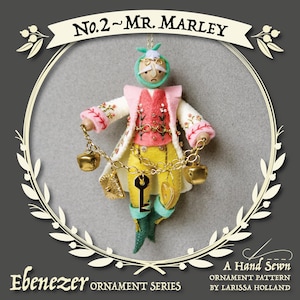 May include: A felt ornament pattern for a character named Mr. Marley. The pattern is part of the Ebenezer Ornament Series by Larissa Holland. The ornament is a hand-sewn felt figure with a pink, white, and yellow outfit, holding a chain with bells and a key.