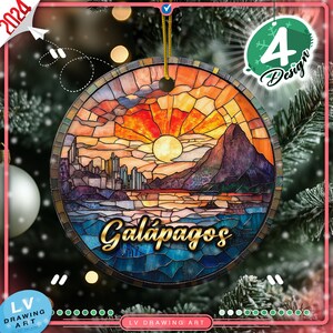 May include: Round Christmas ornament with a stained-glass design featuring a sunset over a mountain and ocean scene. The word "Galápagos" is written in gold script. The ornament has a gold string for hanging and the text "4 Design" is visible.