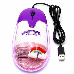 May include: A wired computer mouse with a purple top, a white center section featuring the text Nostalgia Novelty, and a clear bottom compartment filled with liquid and floating holographic stars, accented by a small rainbow figurine.
