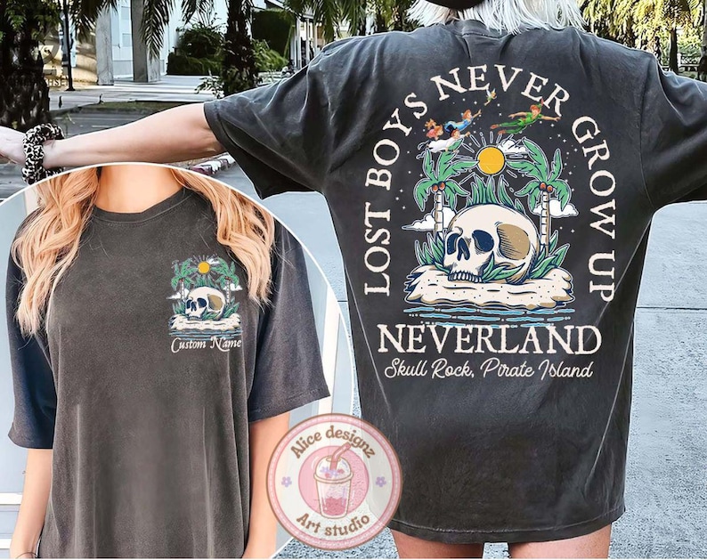 May include: Black t-shirt with a graphic print of a skull and crossbones with the text "Lost Boys Never Grow Up Neverland Skull Rock, Pirate Island".