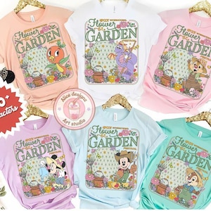 May include: A collection of colorful t-shirts featuring the "Flower & Garden Festival" design. Each shirt showcases a different Disney character, including Orange Bird, Figment, Chip, Dale, Minnie Mouse, and Mickey Mouse, with floral and garden elements.