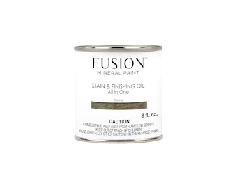 May include: A can of Fusion Mineral Paint Stain & Finishing Oil in Ebony. The can is 8 fluid ounces and has a caution label.