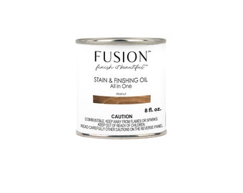 May include: A can of Fusion Stain & Finishing Oil in Walnut color. The can is 8 fluid ounces and has a caution label. The label says "Combustible. Keep away from flames or sparks. Keep out of reach of children. Read carefully other cautions on the reverse panel."