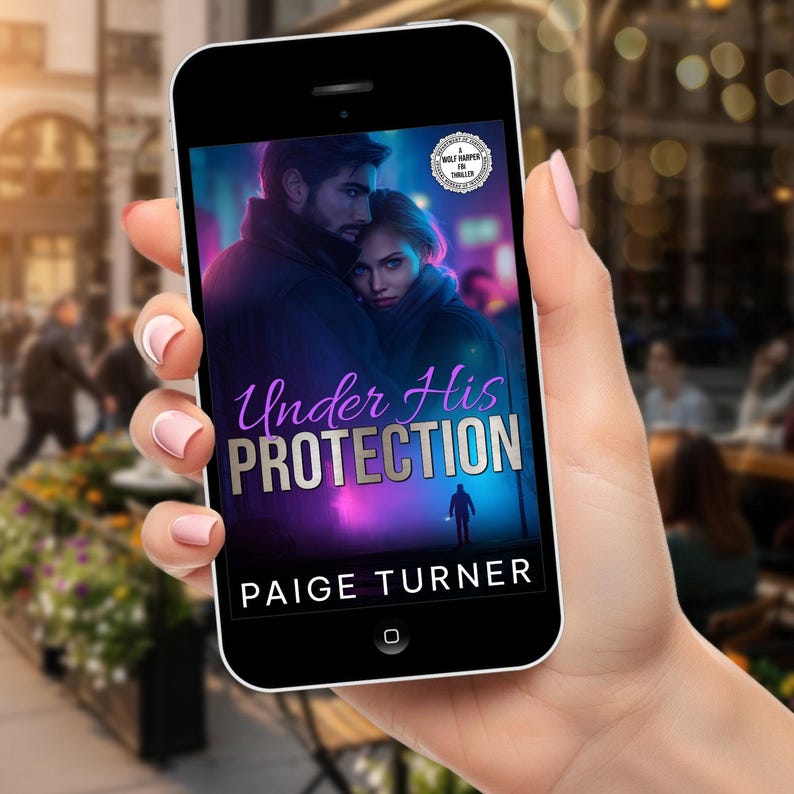 May include: A smartphone displays the cover of the book "Under His Protection" by Paige Turner. The cover art features a couple embracing, with a dark, urban background. The phone is held in a hand with pink nail polish, with a blurred outdoor scene in the background.