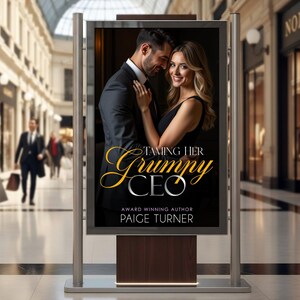 May include: An outdoor advertising display features a book cover with a man and woman embracing. The title, "Taming Her Grumpy CEO," is in gold script. The author's name, Paige Turner, is also displayed.