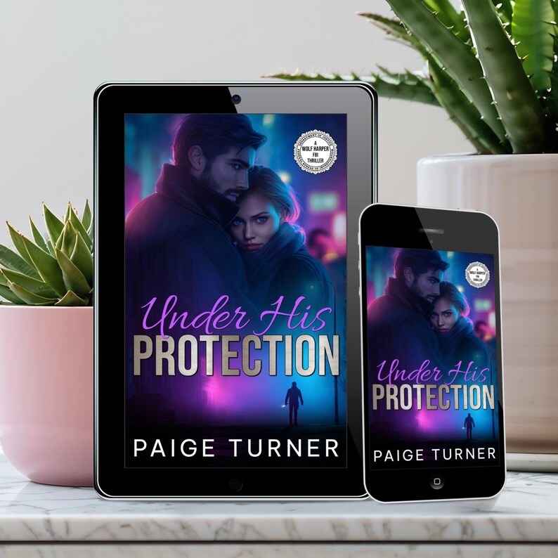 May include: A tablet and smartphone display the cover of a book titled "Under His Protection" by Paige Turner. The cover art features a couple embracing in a city setting with purple and blue hues. A "Wolf Harper Thriller" seal is visible.