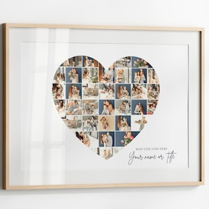 May include: A framed photo collage in a light wood frame. The collage is heart-shaped and filled with small photos. Cursive text at the bottom reads "Main line goes here" and "Your name or title".