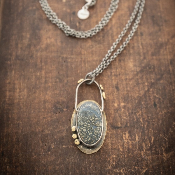 The Reverie Necklace Sterling Silver and 14K Gold Metalsmith Silversmith Moss Pyrite Pendant on Surgical Steel Chain