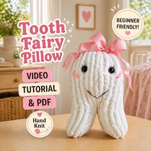 May include: A handmade white tooth fairy pillow with a pink bow, black eyes, and a smiling mouth. The pillow has the text "Tooth Fairy Pillow" and "Video Tutorial & PDF". The design is "Beginner Friendly!" and "Hand Knit".