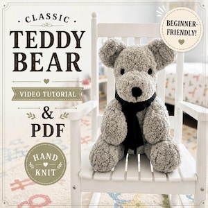 May include: A grey, hand-knitted teddy bear with a black scarf sits on a white rocking chair. The image includes text that reads "Classic Teddy Bear Video Tutorial & PDF" and "Beginner-Friendly!"