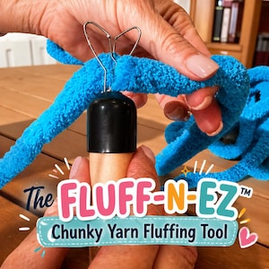 May include: A chunky yarn fluffing tool with a black cap and wooden handle is shown, with a bright blue yarn being fluffed. The text "The FLUFF-N-EZ Chunky Yarn Fluffing Tool" is displayed in a colorful banner.